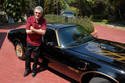 Burt Reynolds et sa Pontiac Trans Am 1977 - Crédit photo Carlisle